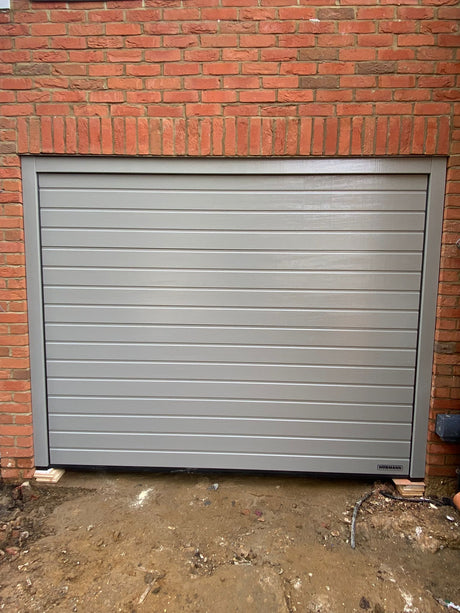 Hormann LPU 42 S-Ribbed Woodgrain Sectional Garage Door